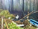 На месте падения вертолета c иркутским губернатором разбит лагерь. СМИ называют причину