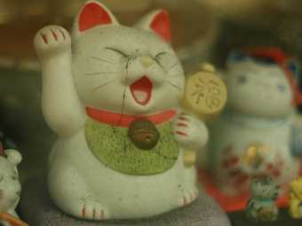   " " Maneki Neko.   Opponent   wikipedia.org